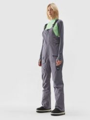 4F Spodnie snowboardowe z szelkami membrana 15000 damskie - szare XS. Szare spodnie narciarskie 4f, bez wzorów, z tkaniny, narciarskie. Za 799.99 zł.