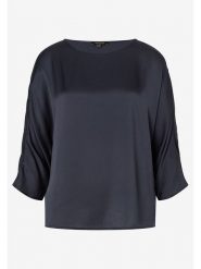 More & More Bluzka w kolorze czarnym rozmiar: 34. Czarne bluzki More & More, s, bez wzorów, z wiskozy, klasyczne, bez kołnierzyka, bez ramiączek. Za 105.63 zł.