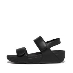 Damskie sandały z regulowanym skórzanym paskiem z tyłu FitFlop Lulu. Czarne sandały Flip Flop, bez wzorów, z materiału, eleganckie, bez obcasa, bez zapięcia. Za 408.30 zł.