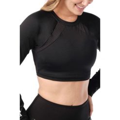 Top fitness damski Zumba Wear Futuristic. Czarne topy ZUMBA WEAR, l, bez wzorów, z poliesteru, sportowe, bez kołnierzyka, bez ramiączek. W wyprzedaży za 149.00 zł.