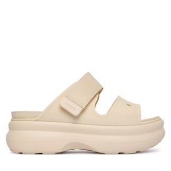 Klapki Crocs. Brązowe klapki Crocs, bez wzorów, bez obcasa, bez zapięcia. Za 249.99 zł.