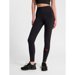 Damskie legginsy Hummel Hiit Intensity. Czarne bielizna termoaktywna damska Hummel, bez wzorów, bez ramiączek, na fitness i siłownię. Za 294.50 zł.