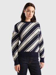 Benetton Wełniany sweter w kolorze granatowo-białym rozmiar: L. Białe swetry Benetton, l, bez wzorów, z wełny, bez ramiączek. Za 159.21 zł.
