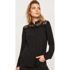 Koszula - Czarny. Koszule marki QUECHUA. W wyprzedaży za 39.99 zł.