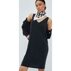 Vero Moda sukienka kolor czarny mini prosta. Czarne sukienki Vero Moda, na co dzień, m, bez wzorów, z dzianiny, bez kołnierzyka, bez ramiączek, mini, proste. Za 109.99 zł.