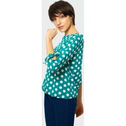 Elegancka bluzka z nadrukiem. Bluzki Greenpoint, bez wzorów, z wiskozy, eleganckie, bez kołnierzyka, bez ramiączek. Za 29.99 zł.