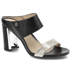 Klapki damskie Carinii, wsuwane na eleganckim obcasie, czarne, B2610_-C63-B77-000-949. Czarne klapki Carinii, bez wzorów, ze skóry, eleganckie, bez obcasa, na obcasie, bez zapięcia. Za 189.00 zł.