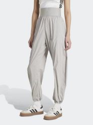 Adidas Spodnie dresowe w kolorze szarym rozmiar: XS. Szare spodnie sportowe adidas, bez wzorów, z dresówki. Za 144.58 zł.