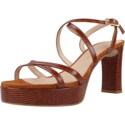 Sandały UNISA OVER LUC Brązowy. Brązowe sandały Unisa, bez wzorów, ze skóry, sportowe, bez obcasa, bez zapięcia. Za 532.99 zł.