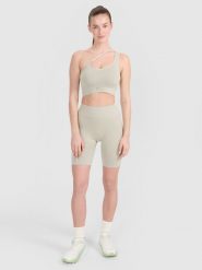 4F Legginsy kolarki bezszwowe treningowe damskie - beżowe XS/S. Brązowe legginsy 4f, bez wzorów. W wyprzedaży za 79.99 zł.