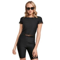Koszulka court dentellé damska Koszulka Urban Classics. Czarne t-shirty sportowe Urban Classics, bez wzorów, z koronki, bez ramiączek. Za 188.50 zł.