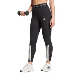 Adidas Techfit Legginsy damskie 7/8, wysoka talia, mocno dopasowane. Czarne legginsy adidas, bez wzorów, z materiału. Za 242.75 zł.