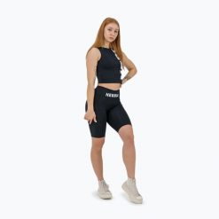 Top treningowy damski NEBBIA Snatched. Czarne topy Nebbia, bez wzorów, sportowe, bez kołnierzyka, bez ramiączek. Za 88.99 zł.