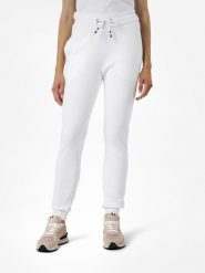 ROSSIGNOL Spodnie dresowe "Logo" w kolorze białym rozmiar: L. Białe spodnie dresowe Rossignol, bez wzorów, z dresówki. Za 183.59 zł.