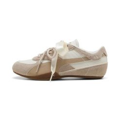 Buty sportowe damskie Puma Bella Mina. Brązowe buty treningowe Puma, na jesień, bez wzorów, z materiału, bez zapięcia. Za 388.50 zł.