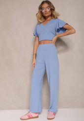 Niebieskie Szerokie Spodnie z Delikatnie Prążkowanego Materiału Kasaida. Niebieskie jeansy Renee, na lato, m, bez wzorów, z jeansu. Za 34.99 zł.