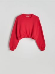 Krótka bluza ze ściągaczem - czerwony. Czerwone bluzy Reserved, l, bez wzorów, z bawełny, bez kaptura. W wyprzedaży za 59.99 zł.