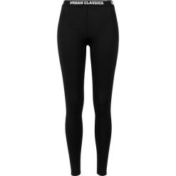 Damskie klasyczne legginsy miejskie. Czarne legginsy Urban Classics, bez wzorów, klasyczne. Za 142.00 zł.