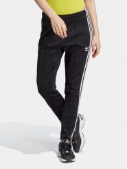Adidas Spodnie dresowe adicolor SST IK6600 Czarny Slim Fit. Czarne spodnie dresowe adidas, bez wzorów, z bawełny. Za 209.99 zł.
