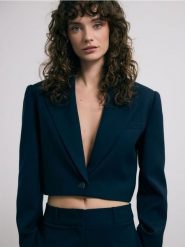 Krótka marynarka - granatowy. Niebieskie marynarki i żakiety Reserved, l, bez wzorów, z tkaniny, bez ramiączek. Za 179.99 zł.