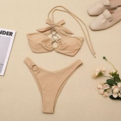 Bikini z ozdobnymi kółeczkami na plażę Here. Zielone bikini Intica, bez wzorów, wakacyjne. Za 109.00 zł.
