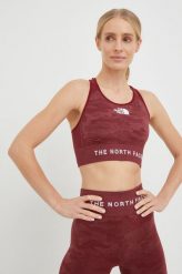 The North Face biustonosz sportowy kolor bordowy wzorzysty. Czerwone biustonosze sportowe The North Face, bez wzorów, z dzianiny, na jogę i pilates. W wyprzedaży za 173.99 zł.