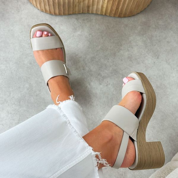 Białe sandały damskie na obcasie M.Daszyński 23126-9. Białe sandały M.Daszyński, bez wzorów, ze skóry, biznesowe, bez obcasa, na obcasie, bez zapięcia. Za 159.00 zł.