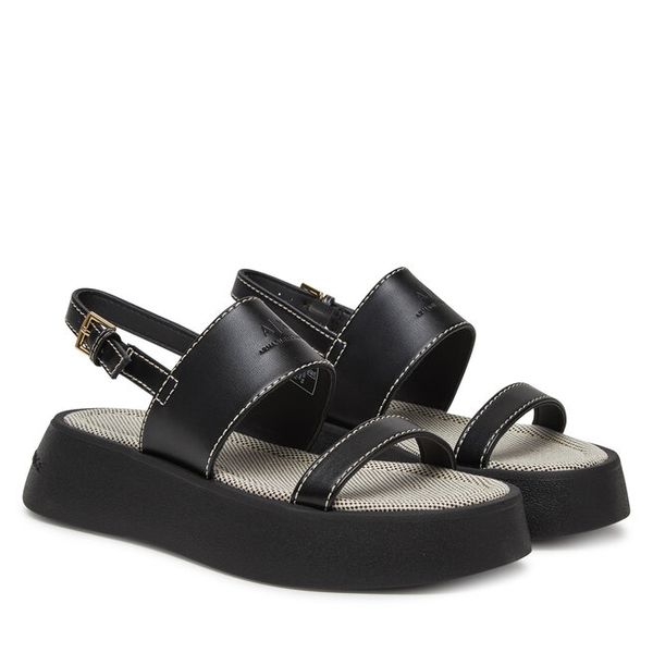 Sandały Armani Exchange. Czarne sandały Armani Exchange, bez wzorów, bez obcasa, na koturnie, bez zapięcia. Za 519.99 zł.