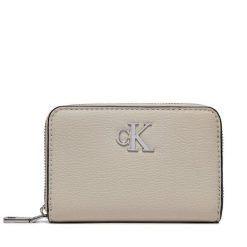 Portfel Calvin Klein. Brązowe portfele Calvin Klein, bez wzorów. Za 229.99 zł.