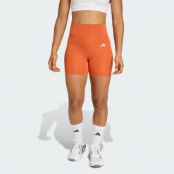 Krótkie legginsy Optime Essentials Workout. Brązowe legginsy adidas, bez wzorów, sportowe, krótkie. Za 179.00 zł.