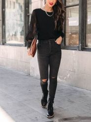 Milan Kiss Bluzka w kolorze czarnym rozmiar: S. Czarne bluzki Milan Kiss, s, bez wzorów, z koronki, bez kołnierzyka, bez ramiączek. Za 152.99 zł.