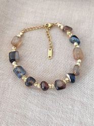 Nakkash Pozłacana bransoletka z agatami rozmiar: onesize. Brązowe bransoletki Nakkash, z agatem, pozłacane. Za 34.99 zł.