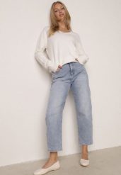 Niebieskie Jeansy Mom Fit z Bawełną Przed Kostkę z Wysokim Stanem Andrele. Niebieskie jeansy Born2be, bez wzorów, z bawełny, klasyczne, z podwyższonym stanem, krótkie. Za 119.99 zł.