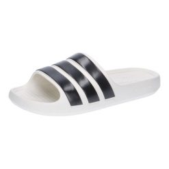 Klapki adidas Adilette Flow. Białe klapki adidas, bez wzorów, z materiału, eleganckie, bez obcasa, bez zapięcia. Za 167.00 zł.