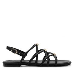 Sandały Nine West. Czarne sandały Nine West, bez wzorów, bez obcasa, na płaskiej podeszwie, bez zapięcia. Za 199.99 zł.