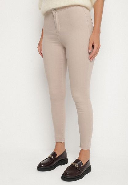 Beżowe Dopasowane Bawełniane Spodnie Irinaes. Brązowe jeansy Born2be, s, z aplikacjami, z bawełny, eleganckie. Za 69.99 zł.