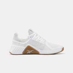 Damskie buty treningowe Reebok FLIP CHARGE 100272303 białe. Białe buty treningowe Reebok, bez wzorów, bez zapięcia, na fitness i siłownię. Za 209.00 zł.
