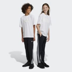 Future Icons 3-Stripes Ankle-Length Pants. Białe spodnie dresowe adidas, bez wzorów, z dresówki. W wyprzedaży za 171.65 zł.
