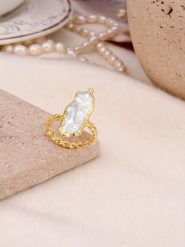 Pierres de Jade Pozłacany pierścionek z perłą rozmiar: onesize. Białe pierścionki Pierres de Jade, z perłą, pozłacane. Za 84.40 zł.