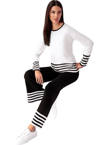 Heine Spodnie w kolorze czarnym rozmiar: 40. Czarne spodnie materiałowe Heine, bez wzorów, z materiału. Za 82.83 zł.