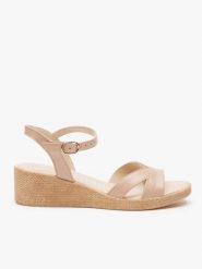 Beżowe sandały na koturnie. Brązowe sandały Ryłko, bez wzorów, ze skóry, z okrągłym noskiem, bez obcasa, na koturnie, bez zapięcia. Za 399.99 zł.