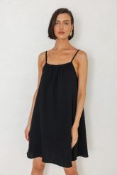 SUKIENKA BELLA CZARNA M - Flawless. Czarne sukienki Flawless, m, bez wzorów, ze skóry, retro, bez kołnierzyka, bez ramiączek, mini. Za 398.00 zł.