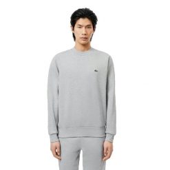 Klasyczna szara bluza Lacoste z haftowanym logo. Szare bluzy Lacoste, xl, bez wzorów, z bawełny, klasyczne, bez ramiączek, bez kaptura. Za 542.50 zł.