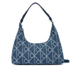 Torebka Calvin Klein. Niebieskie torebki klasyczne Calvin Klein, bez wzorów, z denimu, klasyczne, bez dodatków. Za 489.99 zł.