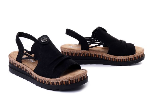 RIEKER V7972-00 black, sandały damskie. Czarne sandały Rieker, bez wzorów, bez obcasa, na koturnie, bez zapięcia. Za 271.92 zł.
