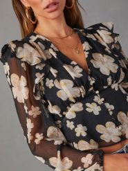 LA Angels Bluzka w kolorze czarno-beżowym rozmiar: M. Brązowe bluzki LA Angels, m, bez wzorów, bez kołnierzyka, bez ramiączek. Za 87.81 zł.