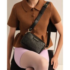 Torebka Nine West. Czarne listonoszki Nine West, bez wzorów, bez dodatków. Za 219.99 zł.