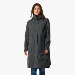 Płaszcz wiatroszczelny kobieca Swedemount Öckerö Shell Coat. Niebieskie płaszcze SWEDEMOUNT, xl, bez wzorów, z materiału, z kapturem. Za 699.99 zł.