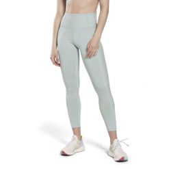 Damskie legginsy z wysokim stanem w prążki Reebok. Niebieskie legginsy Reebok, bez wzorów, z dzianiny. Za 263.60 zł.