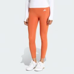Legginsy 7/8 bez szwu z przodu Optime Essentials. Brązowe legginsy adidas, bez wzorów, sportowe. Za 219.00 zł.